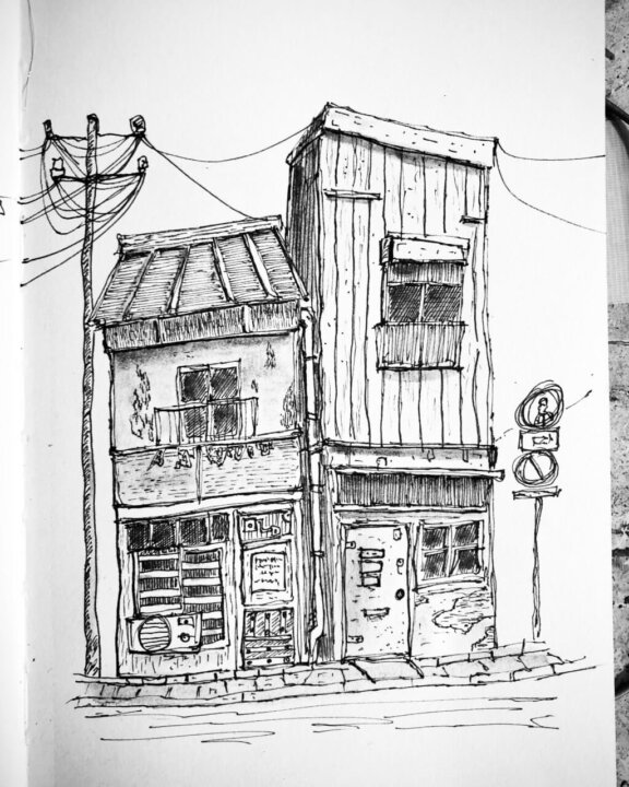 Urban Sketching eines alten Hauses mit Feinliner.